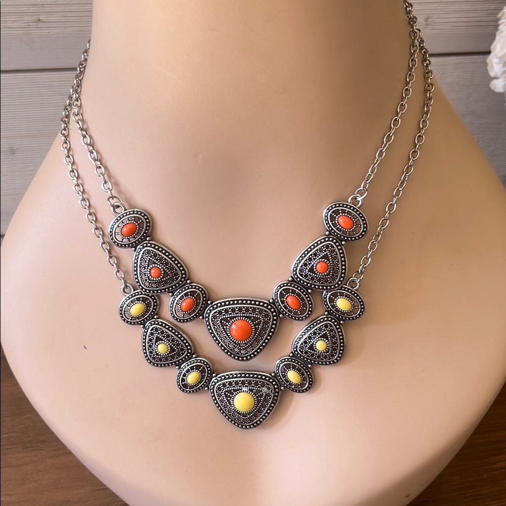 Two Silver Necklaces with Orange and Yellow Accents